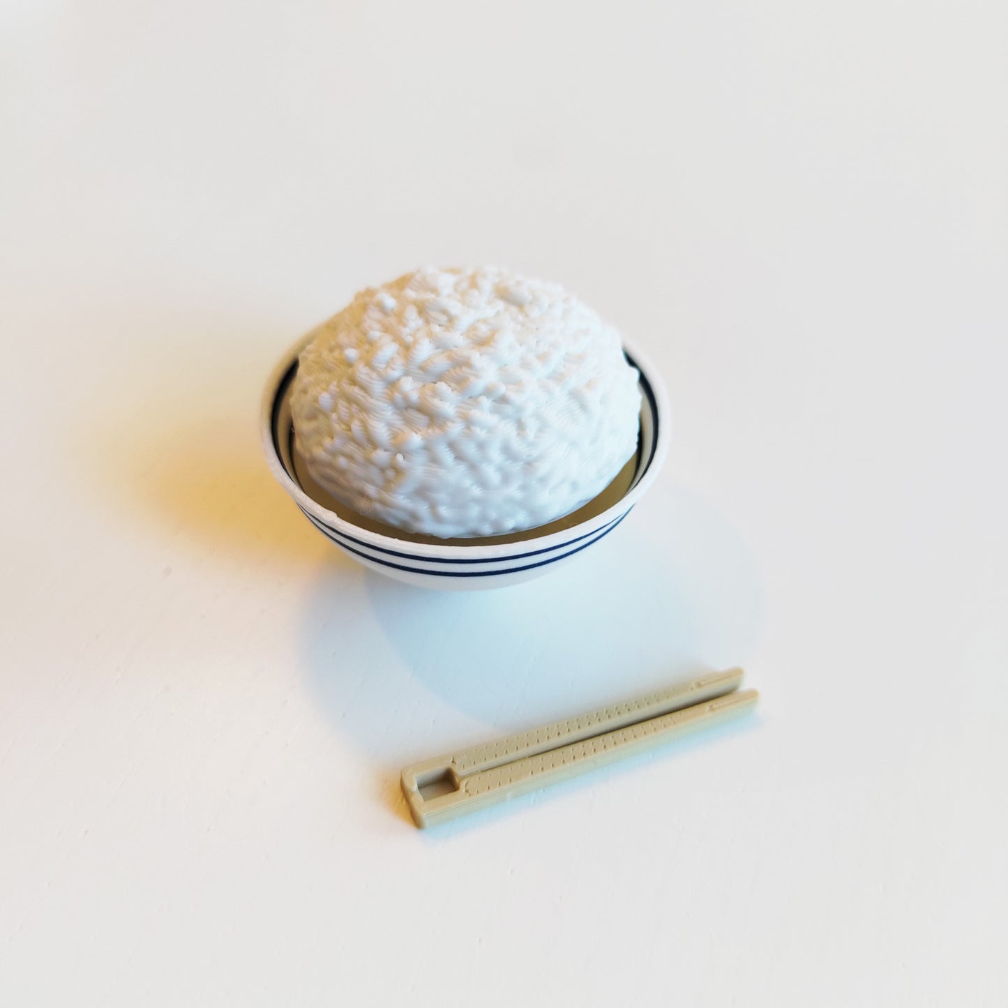 Bowl of Rice with Mini Chopsticks Clicker