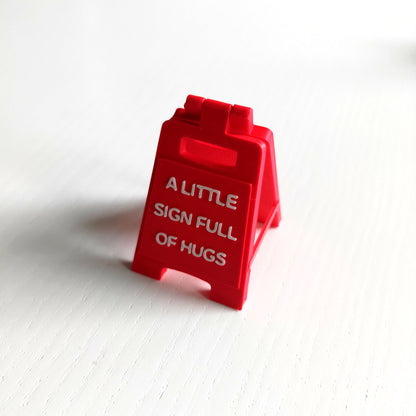 A Little Sign Full Of Hugs